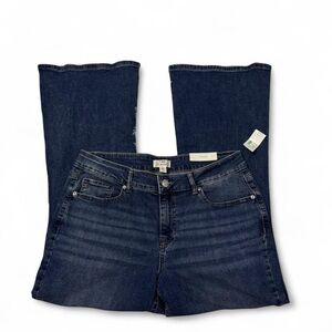 Navy blue Maurice’s mid rise flare jeans with a stretch